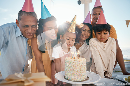 Image of Birthday cake, children and senior family in summer for group celebration, party and grandparents love and care. Happy latino people with kids or girl celebrate on outdoor patio, holiday and candles