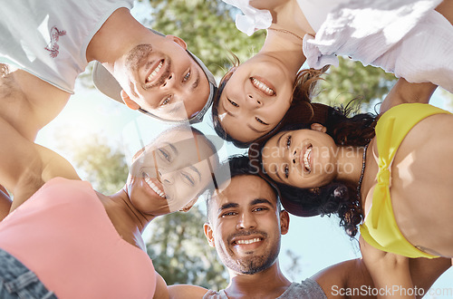 Image of Diversity, group huddle for teamwork and happy together outside with a lens flare. Portrait or support, community or motivation and face of friends smile for summer holiday or vacation outdoors