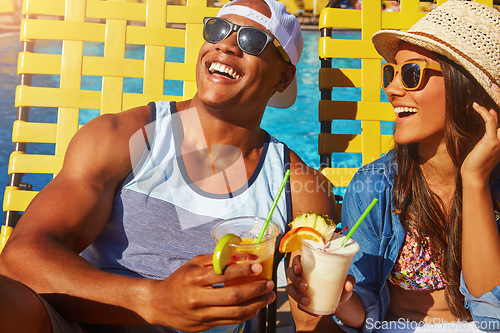 Image of Couple, bonding and swimming pool with happiness and cocktails at resort for fun with sunshine. Drinks, summer and girl or boy at poolside for vacation to relax with smile or couple, tanning.