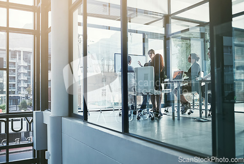 Image of Presentation, window or business people in a meeting for financial analysis or sales report in a company. Data analytics, manager or speaker planning a growth strategy on screen monitor in mentorship