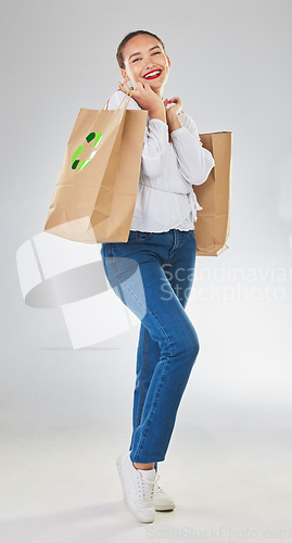 Image of Recycle logo, environment and woman with bag, sustainability with shopping isolated on white background. Environmental, retail and eco friendly, female person and sustainable development in studio