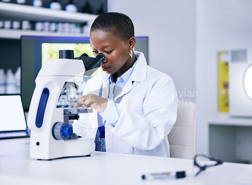 Image of Scientist, black woman and microscope, analysis and science study with medical research and biotechnology in lab. Female person, doctor and pathology, check test sample with scientific experiment