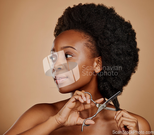 Image of Haircut, scissors or black woman with afro in studio on a brown background thinking of a change. Salon, transformation or natural African female model at the hairdresser for hairstyle or beauty