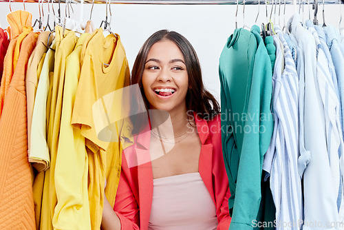 Image of Fashion, choice and clothes with woman in studio for decision, shopping and wardrobe. Boutique, retail and store with face of female customer on white background for search, creative and sale