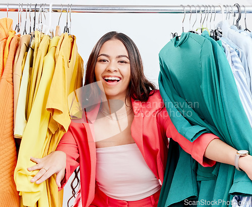 Image of Fashion, smile and clothes with portrait of woman in studio for decision, shopping and wardrobe. Boutique, retail and store with face of customer on white background for search, creative and sale