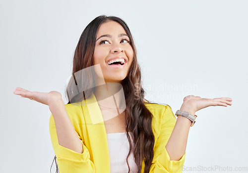 Image of Thinking, excited and happy woman comparison with business space, mock up scale balance or corporate option. Advertising smile, palm gesture and studio person with decision choice on white background