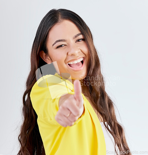 Image of Portrait, support and woman with thumbs up, excited or achievement on a white studio background. Face, female person and like with hand gesture, agreement or promotion with a sign, feedback or review