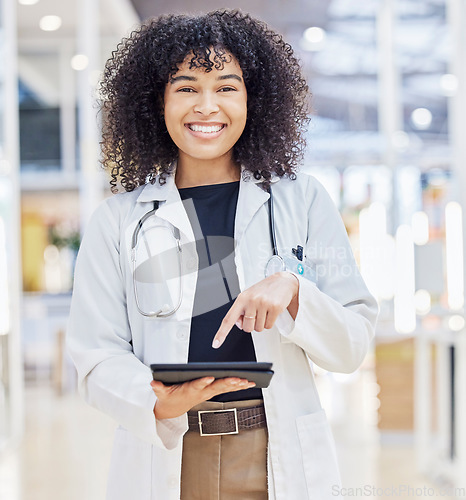 Image of Portrait, doctor and happy woman with tablet for research, telehealth and healthcare in hospital. Digital technology, medical professional and person from South Africa on app, internet and wellness.