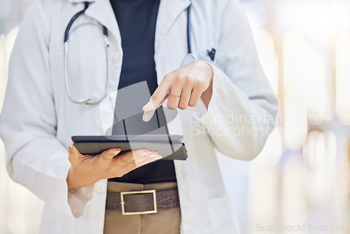 Image of Hands, doctor and digital tablet for research in hospital, telehealth and healthcare in clinic. Technology, medical professional and person on app for wellness, typing email and internet website.