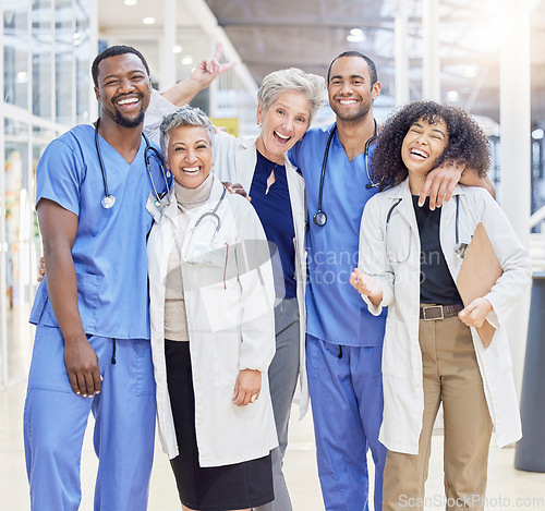 Image of Happy portrait, team and doctors for healthcare service, leadership and teamwork in hospital diversity. Professional medical woman, mentor and internship nurses in group, funny peace sign or excited