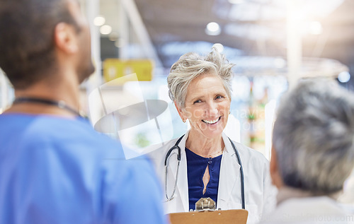 Image of Clipboard, doctors and nurses for medical advice, support and schedule management, hospital questions and talking. Happy mentor, healthcare staff and people or woman, checklist and clinic compliance