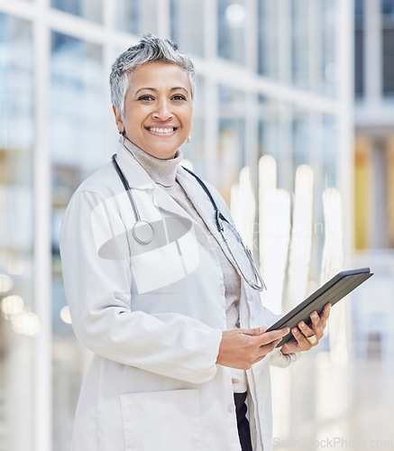 Image of Portrait of doctor, woman and tablet for medical review, data research and healthcare in hospital. Happy female physician, digital technology and planning telehealth network, connection or online app