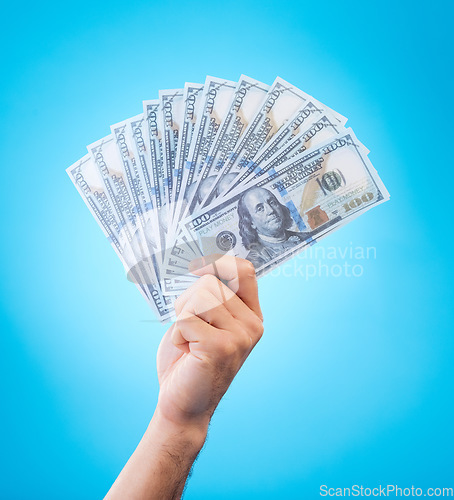 Image of Money, studio hands and person show dollar bills, reward or bonus cash salary, profit or wealth. Financial pay increase, winning and rich winner with income, finance revenue or win on blue background