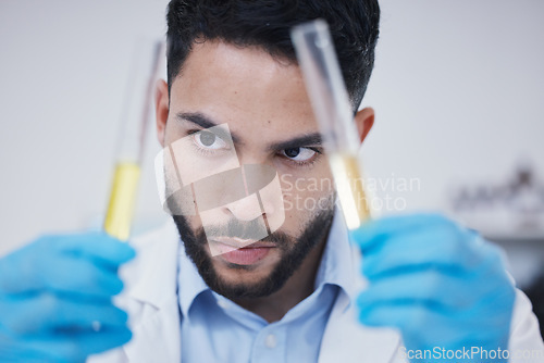 Image of Test tube, scientist thinking and man in research, vaccine solution or data analysis in laboratory investigation. Healthcare, medical and young science person focus with medicine or liquid comparison