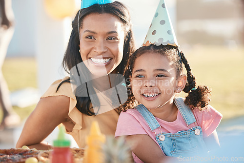 Image of Party, outdoor and mother with girl, birthday and celebration with happiness, event and cheerful. Mama, daughter or female child with a happy parent, food and excited with hats, park or joy with love