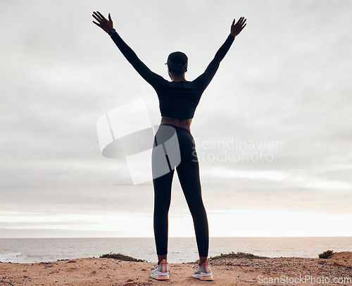 Image of Success, fitness and back of woman in nature with achievement, celebration and goals for workout. Sports, freedom and happy female person with hands in air for exercise, training and running target