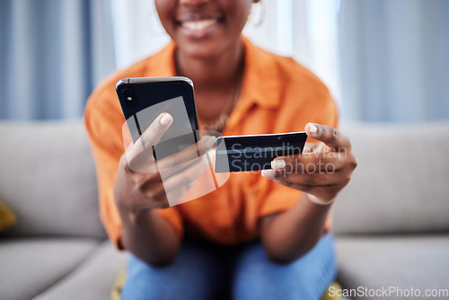 Image of Hands, ecommerce or happy woman with credit card or phone on payment on internet website or fintech. Online shopping, finance blur or excited girl typing in money transfer via mobile banking at home