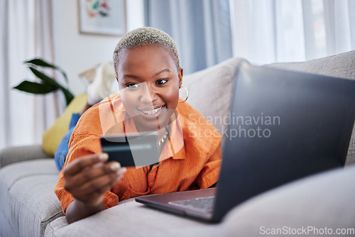 Image of Laptop, relax or happy woman online shopping with credit card for digital product with discount code. Smile, promo or black girl with financial payment to buy on sale on fintech application at home