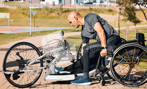 Image of Wheelchair, athlete or a man with a disability and bike for handicap race, fitness and recumbent challenge. Exercise, park and a handbike of paraplegic sports person outdoor for cardio and training