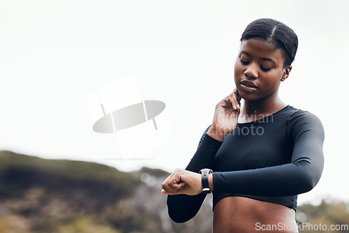 Image of Woman, neck and heart rate for fitness, pulse and mockup space for outdoor running. Sports runner, black female athlete or check smart watch for healthy progress, exercise or monitor wellness of time