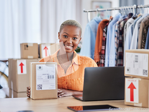 Image of Black woman, portrait and box of fashion designer in small business logistics or service at boutique. Happy creative African female person smile with boxes in courier startup or retail clothing store