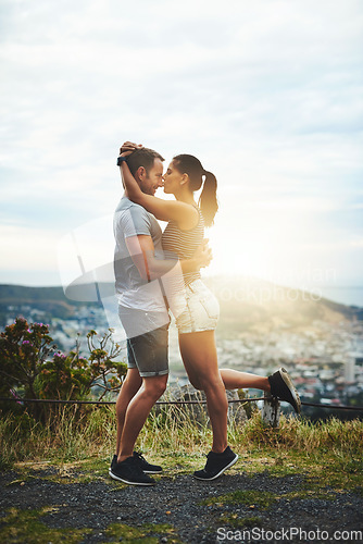 Image of Kiss, mockup or happy couple hug in nature on outdoor date for love with support, loyalty or freedom. Romantic man, affection space or woman on holiday vacation together to relax or travel in USA