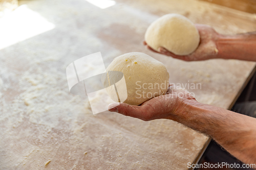 Image of Bread dough balls in bakery