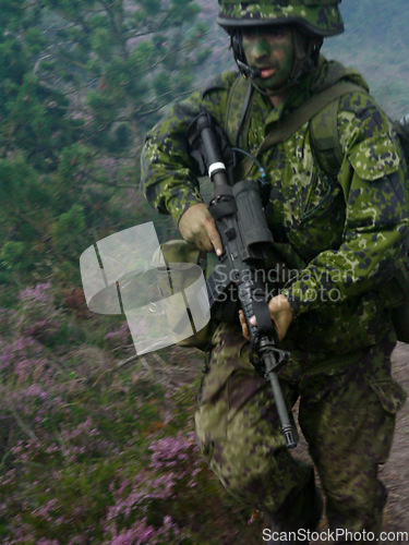 Image of Military soldier, rifle and running in forest with camouflage for secret mission, scout or outdoor intel. Army man on route or move with gun, firearm or uniform for USA operation, terrorist or attack
