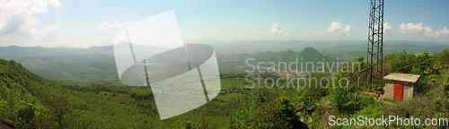 Image of Mountain, forest and banner of radio tower with blue sky for military operation, base or outdoor checkpoint in nature. Green hills, clouds or signal antenna by shelter for communication or rendezvous