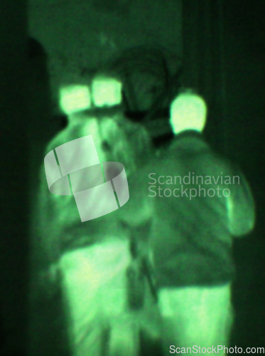 Image of Military, night vision and target in green, overlay or dark silhouette of spy, people or terrorist risk to soldier. Police, surveillance or men training in infrared scope for army or security mission