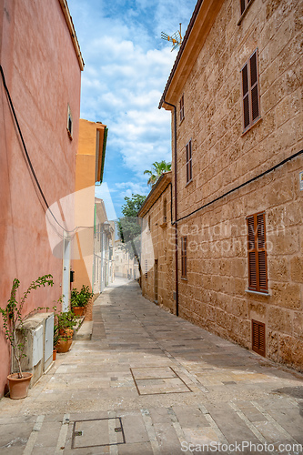 Image of Typical old town in Mallorca with a narrow street. Alcudia. Balearic Islands Spain.