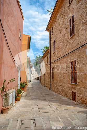 Image of Typical old town in Mallorca with a narrow street. Alcudia. Balearic Islands Spain.