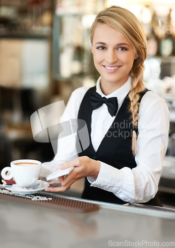 Image of Coffee, barista and portrait of woman waiter in cafe making a latte, espresso or cappuccino at an event. Hospitality, server and female employee preparing a warm beverage in cup by a bar restaurant