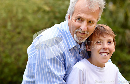 Image of Elderly, man or son with hug in nature outdoor at a park, backyard or environment for bonding and care. Family, father or child with embrace for love, support and relationship with happiness or smile