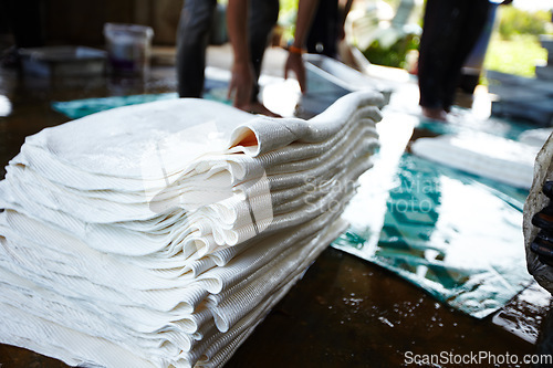 Image of Rubber, manufacturing and closeup of sheet in workshop, factory and production warehouse. Sustainable business, industrial agriculture and equipment for rolling resource, plastic and natural material