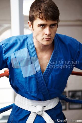 Image of Man, karate and fight, sports contest with muay thai and training for self defense in gym. Athlete, combat and power with fitness, martial arts and energy with warrior, exercise and taekwondo