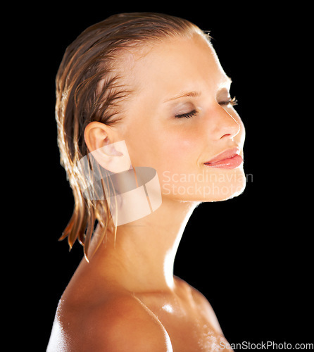 Image of Shower, beauty and face of woman on black background for wellness, grooming and cosmetics. Satisfaction, luxury spa and happy person with eyes closed for skincare, washing and cleaning in studio
