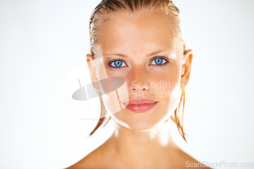 Image of Portrait of woman on a white background for shower, wellness and grooming satisfaction in studio. Beauty, luxury spa and face of isolated happy person with wet hair for skincare, washing and cleaning