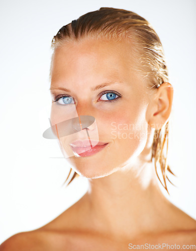 Image of Shower, skincare and woman on a white background for wellness, grooming and beauty. Dermatology, luxury spa and face of isolated person with wet hair for washing, satisfaction and cleaning in studio