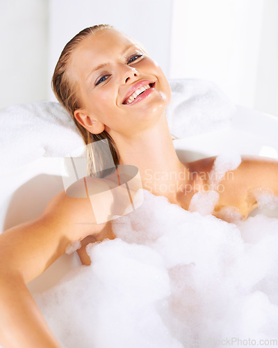 Image of Happy, woman and bath portrait with cleaning, skincare and shampoo treatment with smile. Wellness, bubble and smile of a female person with soap in a bathroom for hair wash and relax with foam