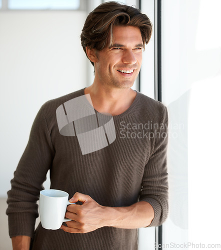 Image of Coffee, smile and young man in apartment with thinking, vision or reflection face expression. Handsome, happy and male person from Canada with latte, cappuccino or espresso with an idea at home.
