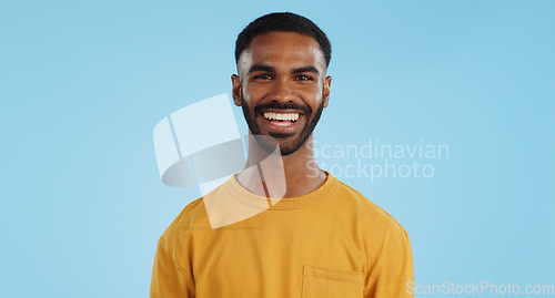 Image of Happiness, man and laughter with comedy in studio, casual fashion and portrait by blue background. Mexican person, face and positive attitude with reaction to silly joke, mockup and announcement