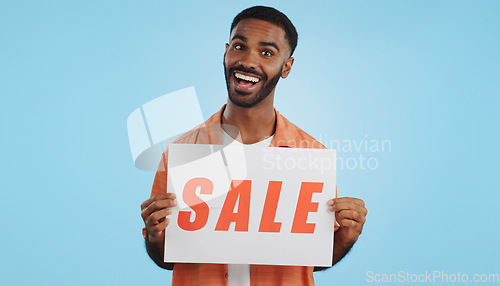 Image of Studio sales poster, happy man and surprise ads commercial, discount promotion banner or notification sign. Billboard info, placard and ambassador presentation, choice or deal on blue background