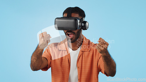 Image of Gamer man, virtual reality and glasses in studio with hand, click and swipe in metaverse by blue background. Person, AR vision and futuristic 3D user experience with grab, cyber ui and digital world
