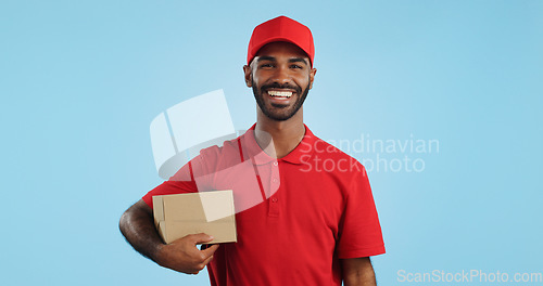 Image of Happy man, box and delivery in transport service, package or order in studio against a blue background. Portrait of male person or courier guy smile with parcel, cargo or logistics on mockup space