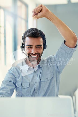 Image of Office, telemarketing and man with celebration, customer service and computer with achievement. Person, consultant and employee with happiness, pc, tech support and success with kpi target and crm