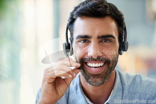 Image of Portrait, telemarketing and man with customer service, smile and telecomsales, headphones and tech support. Person, consultant and employee with happiness, pc, call center and communication with crm