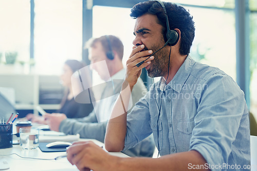Image of Yawn, tired and telemarketing with man, call center and overworked with crm, help desk and office. Business, burnout or employee with headphones, agent and fatigue with consultant or customer service