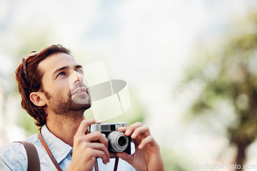 Image of Photographer, camera or man on holiday, vacation or trip for a fun summer adventure in Italy looking up. Bokeh mockup space, tourist or person with sightseeing in nature journey or park for travel