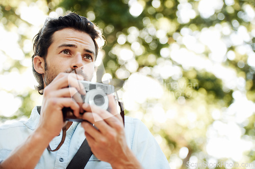 Image of Camera, photographer or man in nature on holiday vacation trip for creativity, shooting or tourism memory. Photography, travel or male tourist with pictures for sightseeing or trees in park in summer